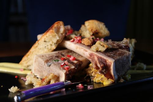 image of people enjoying drinks at the bar