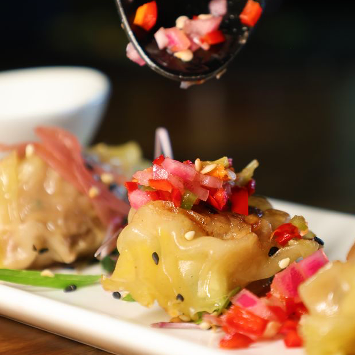 image of people enjoying drinks at the bar