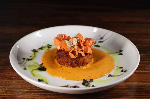 image of people enjoying drinks at the bar