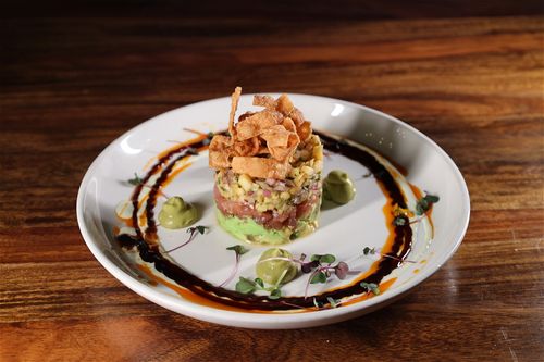 image of people enjoying drinks at the bar