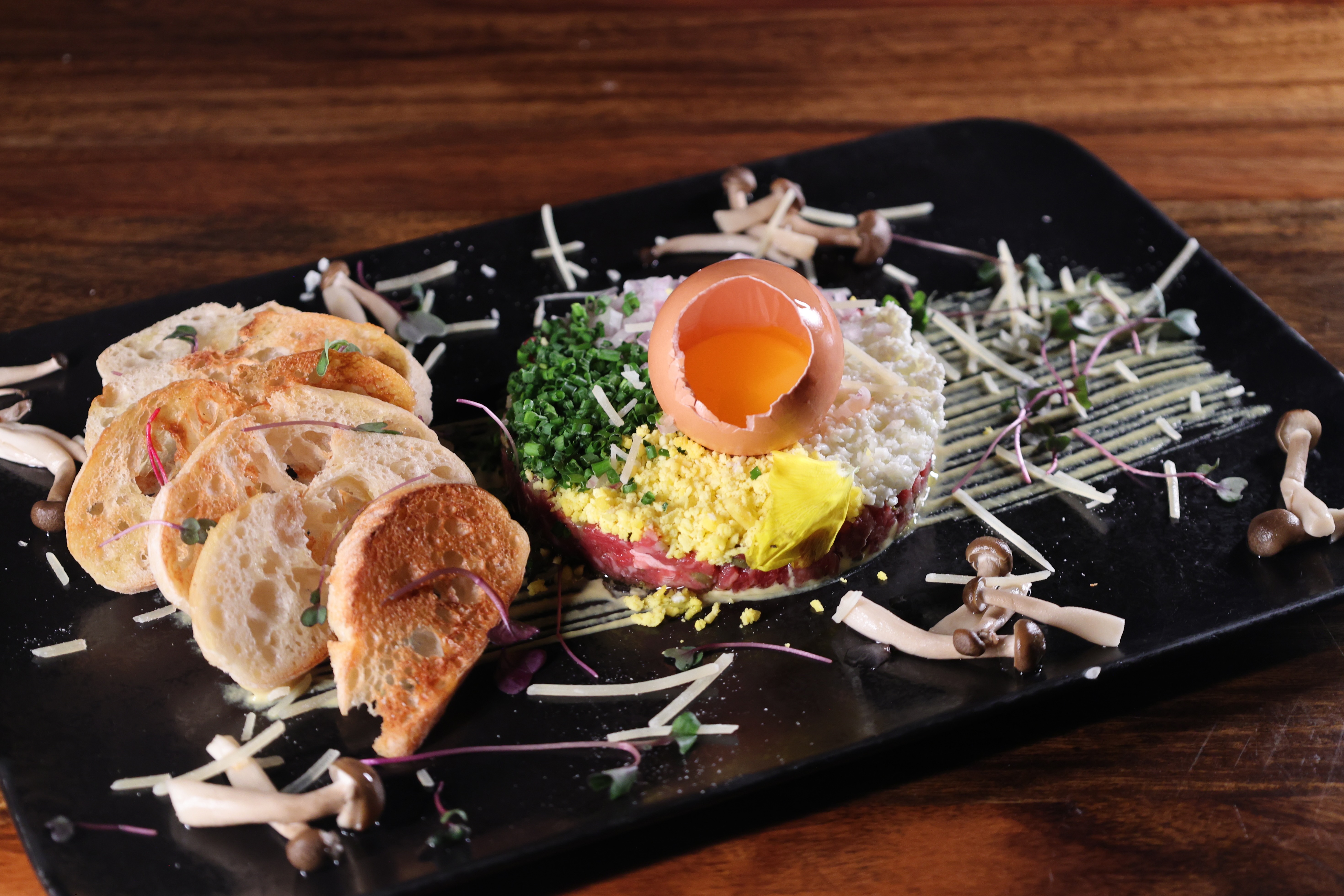 image of people enjoying drinks at the bar