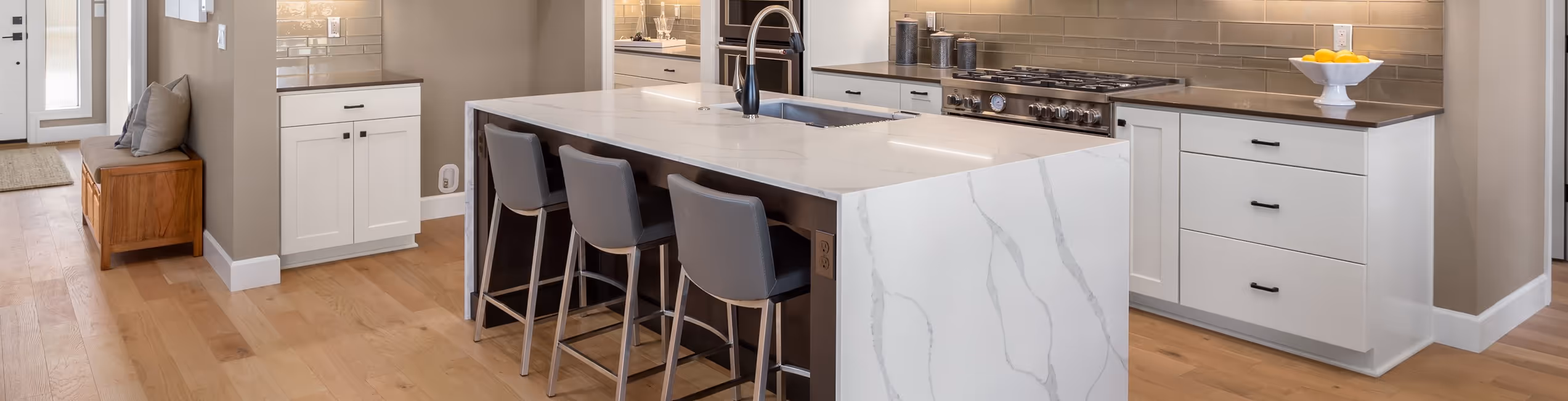 Modern kitchen with hardwood flooring installation by James River Flooring Richmond VA metro contractors