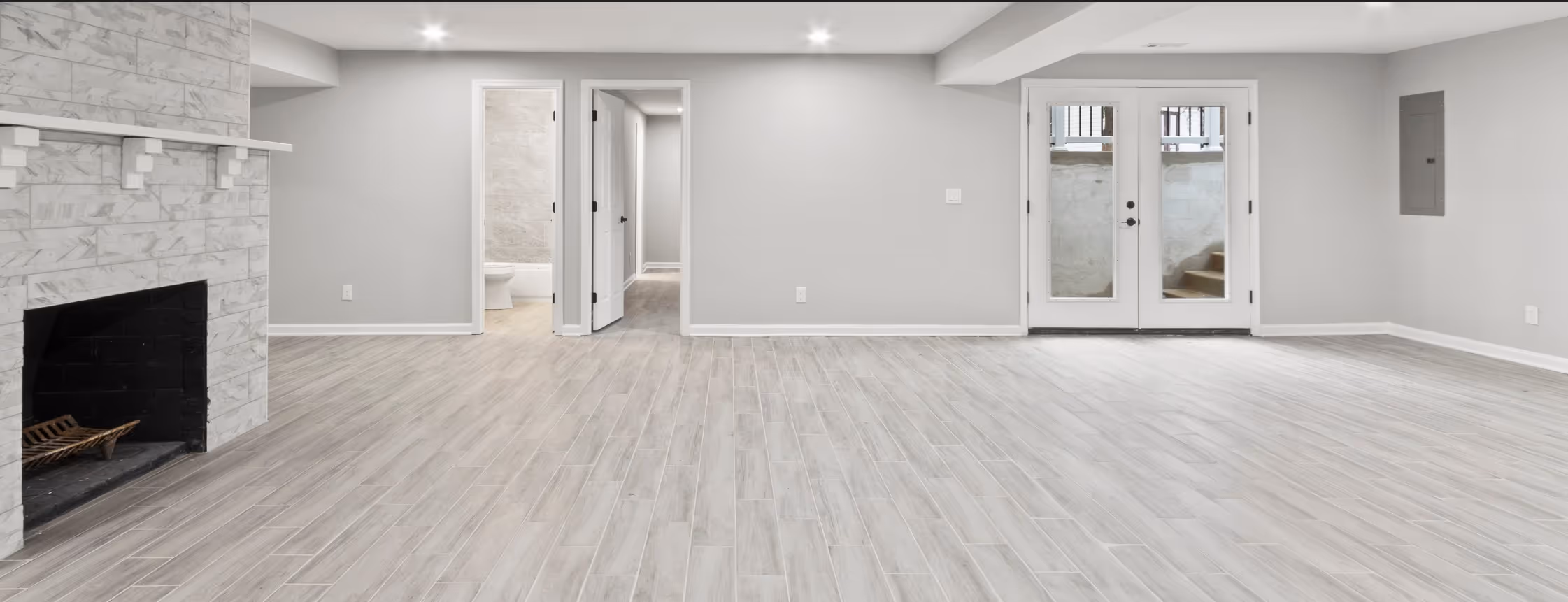 Gray vinyl plank basement flooring by James River Flooring Richmond VA metro residential services