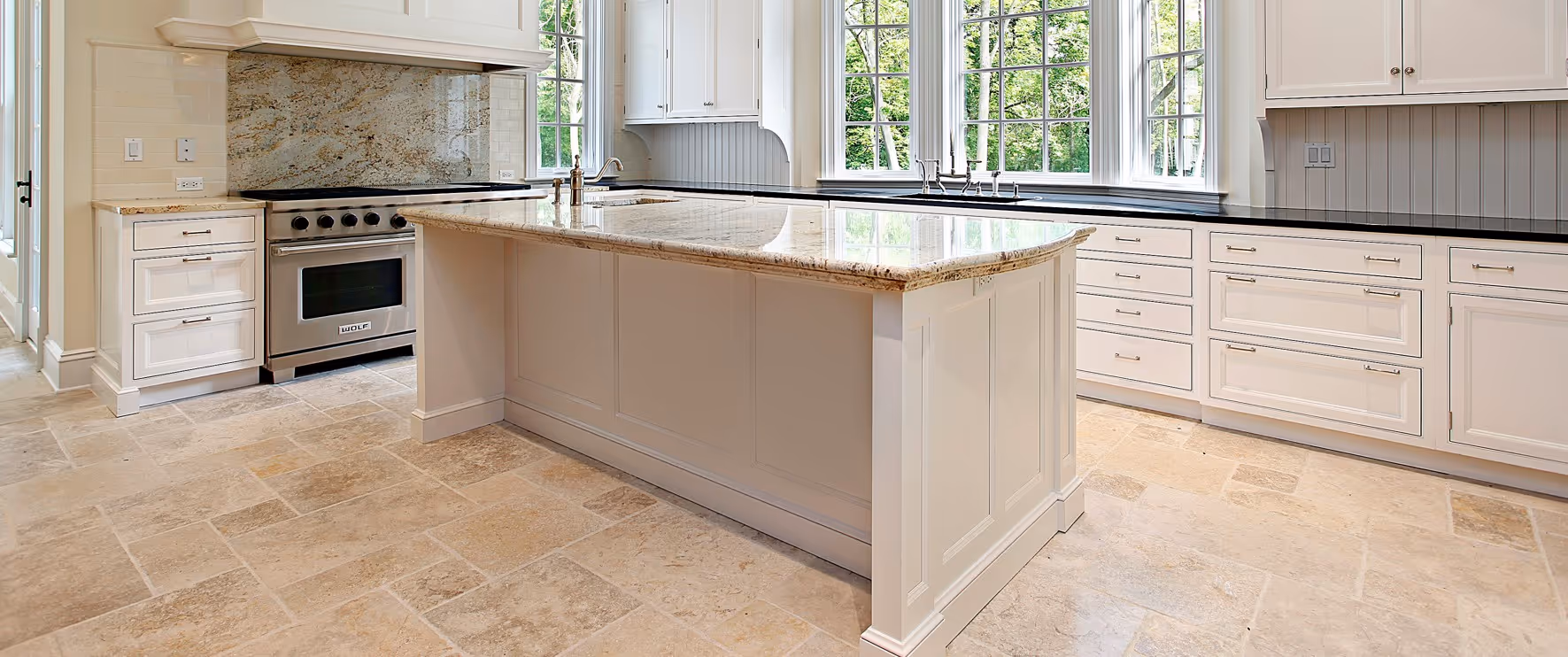 Beige travertine tile kitchen flooring by James River Flooring Richmond VA metro area specialists