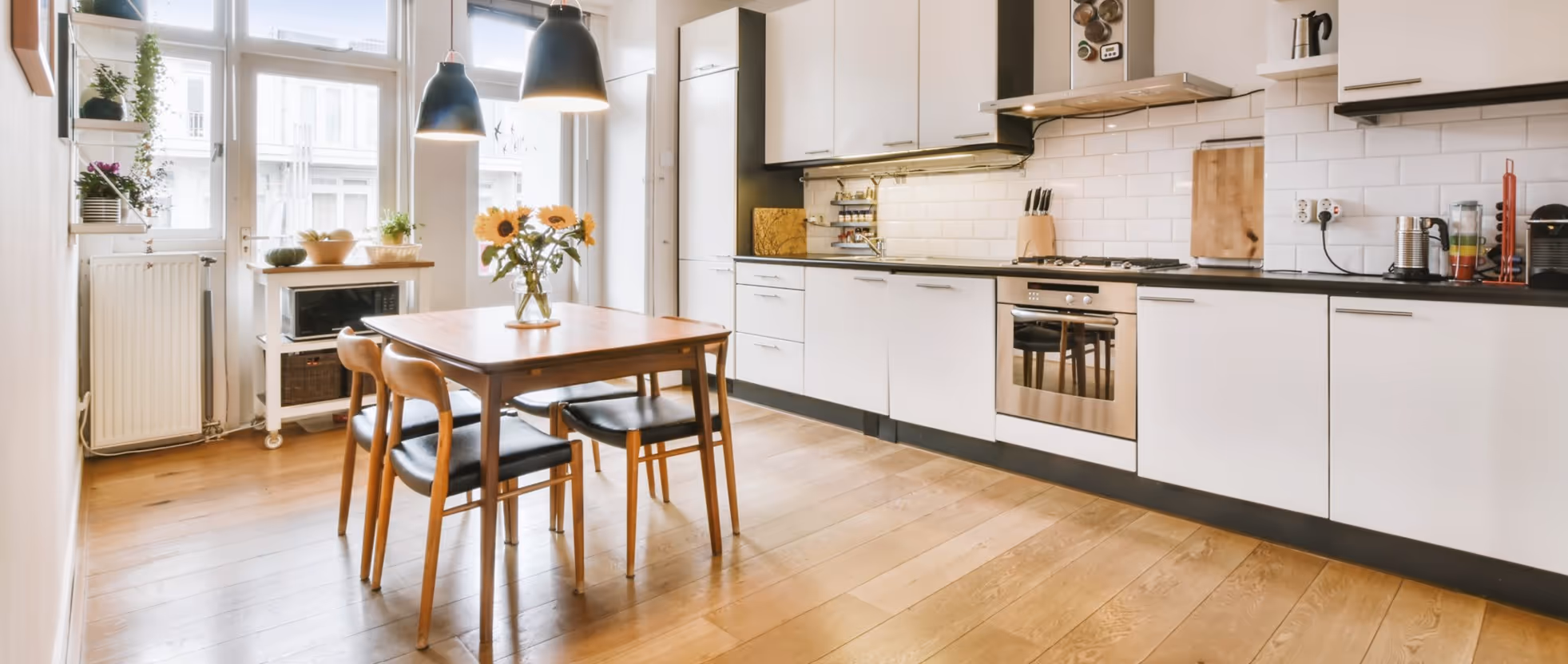 Light hardwood kitchen flooring from James River Flooring free consultation Richmond VA metro area