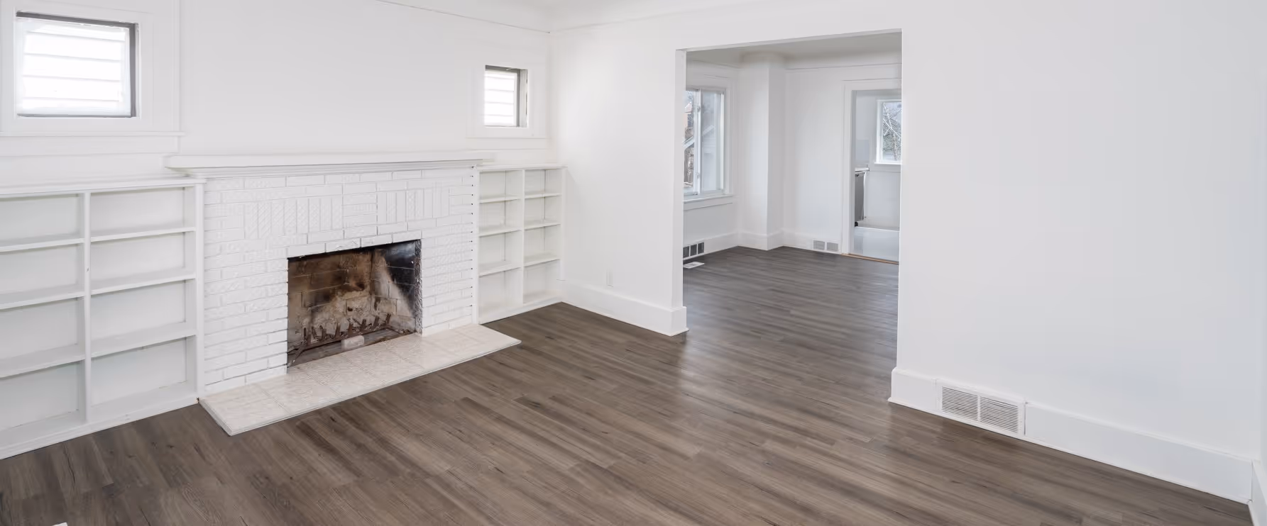 Gray laminate flooring in living room by James River Flooring Richmond VA metro area installers