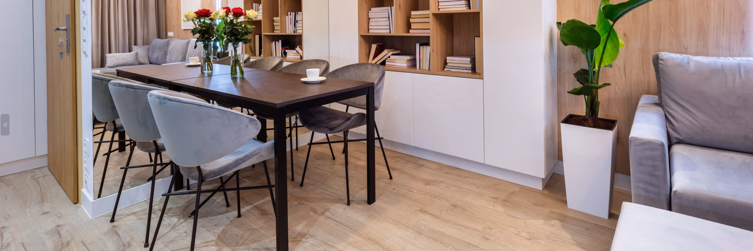Light vinyl plank flooring in dining area by James River Flooring Richmond VA metro installers