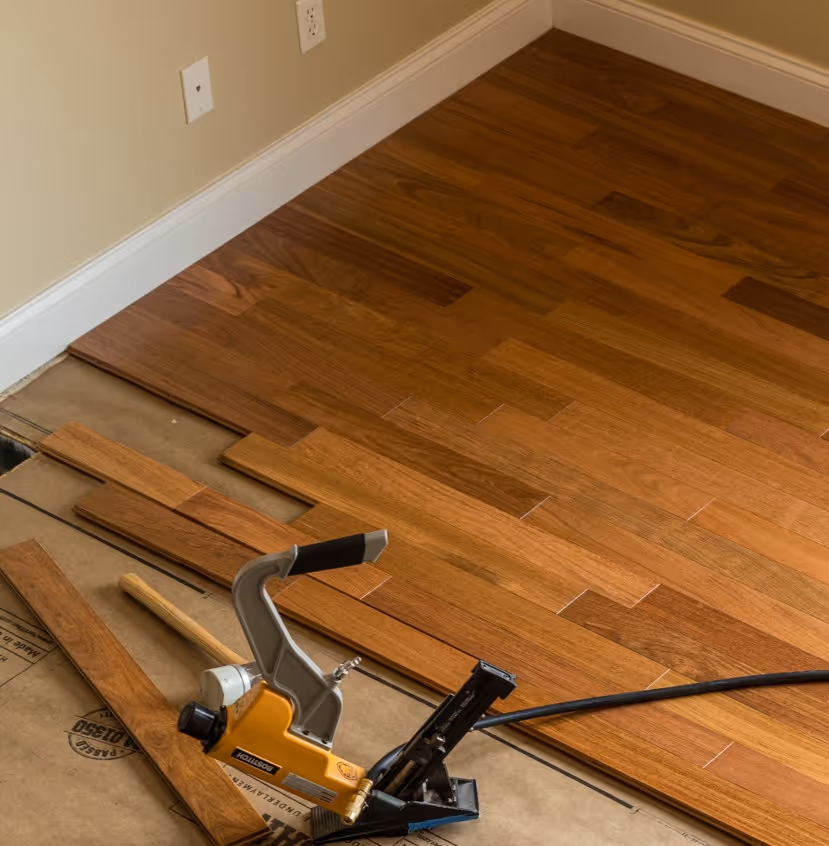 Professional strip hardwood installation in light oak showcasing clean lines for Goochland County homeowners