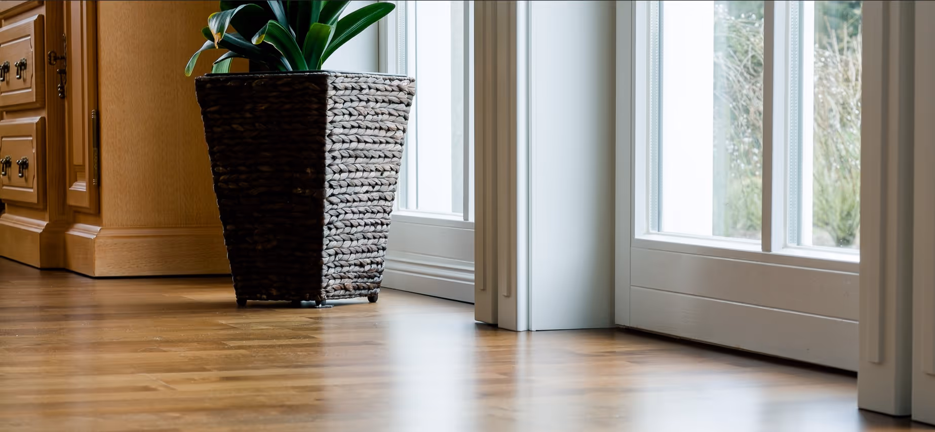 Scratch-resistant luxury vinyl plank flooring in Richmond home showing durability against pet wear with natural wood appearance