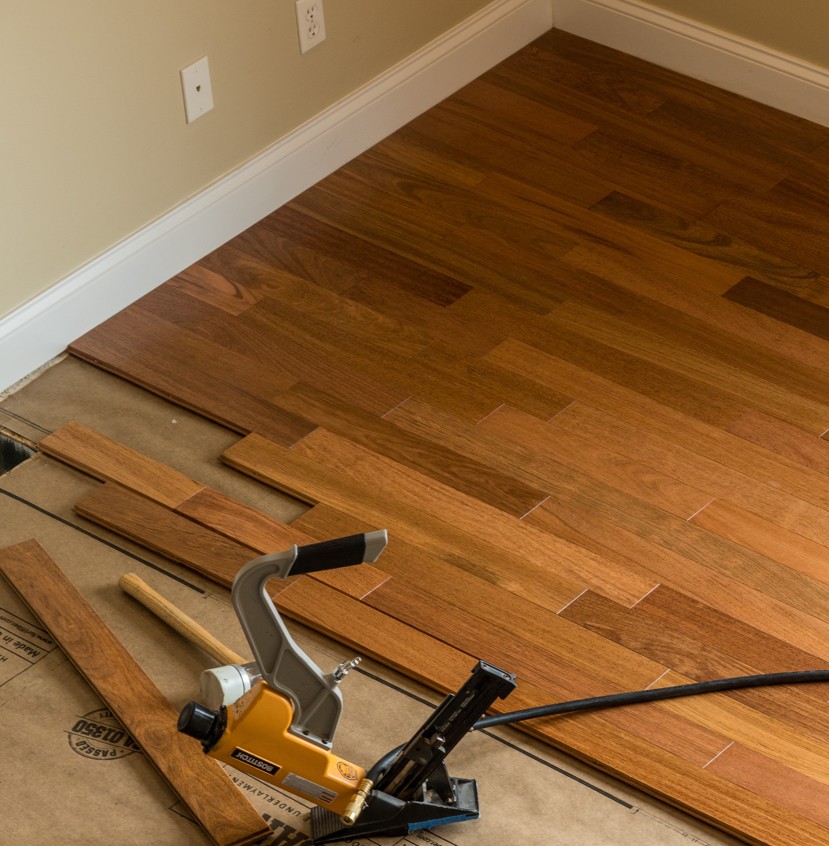 Professional strip hardwood installation in blonde oak showcasing traditional style for Petersburg homeowners