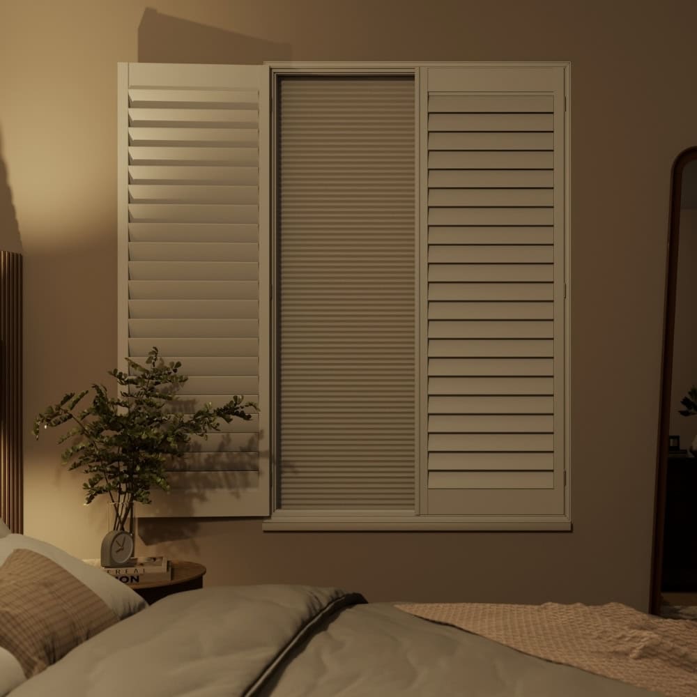 white finished blackout shutters with integrated blackout blind
