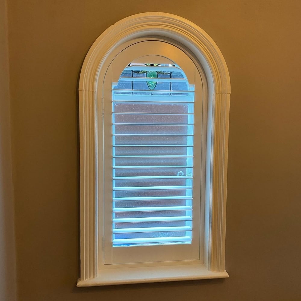round top white shaped shutters