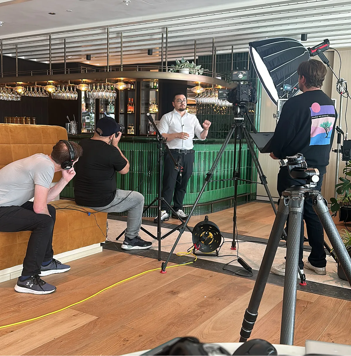 A chef speaking to camera in a restaurant setting.