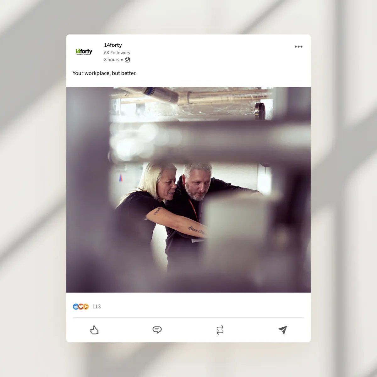 An Instagram post of a team discussing a project.