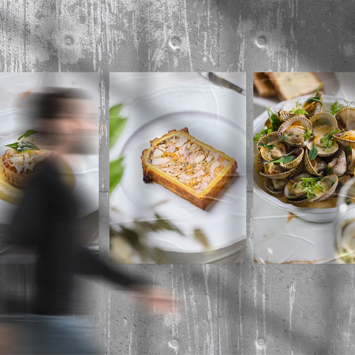 Images of food showcased on a wall with a man walking past.