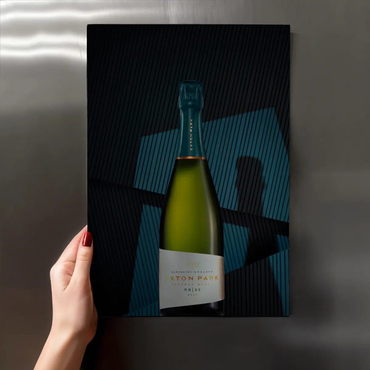 A hand holding a picture of a bottle of Exton Park wine.