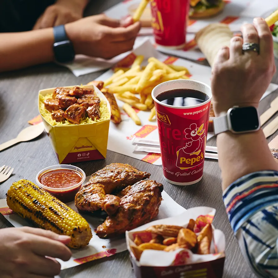 A table of delicious food from Pepe's piri piri chicken