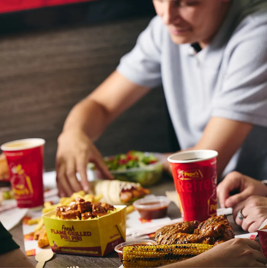 A table of delicious food from Pepe's piri piri chicken