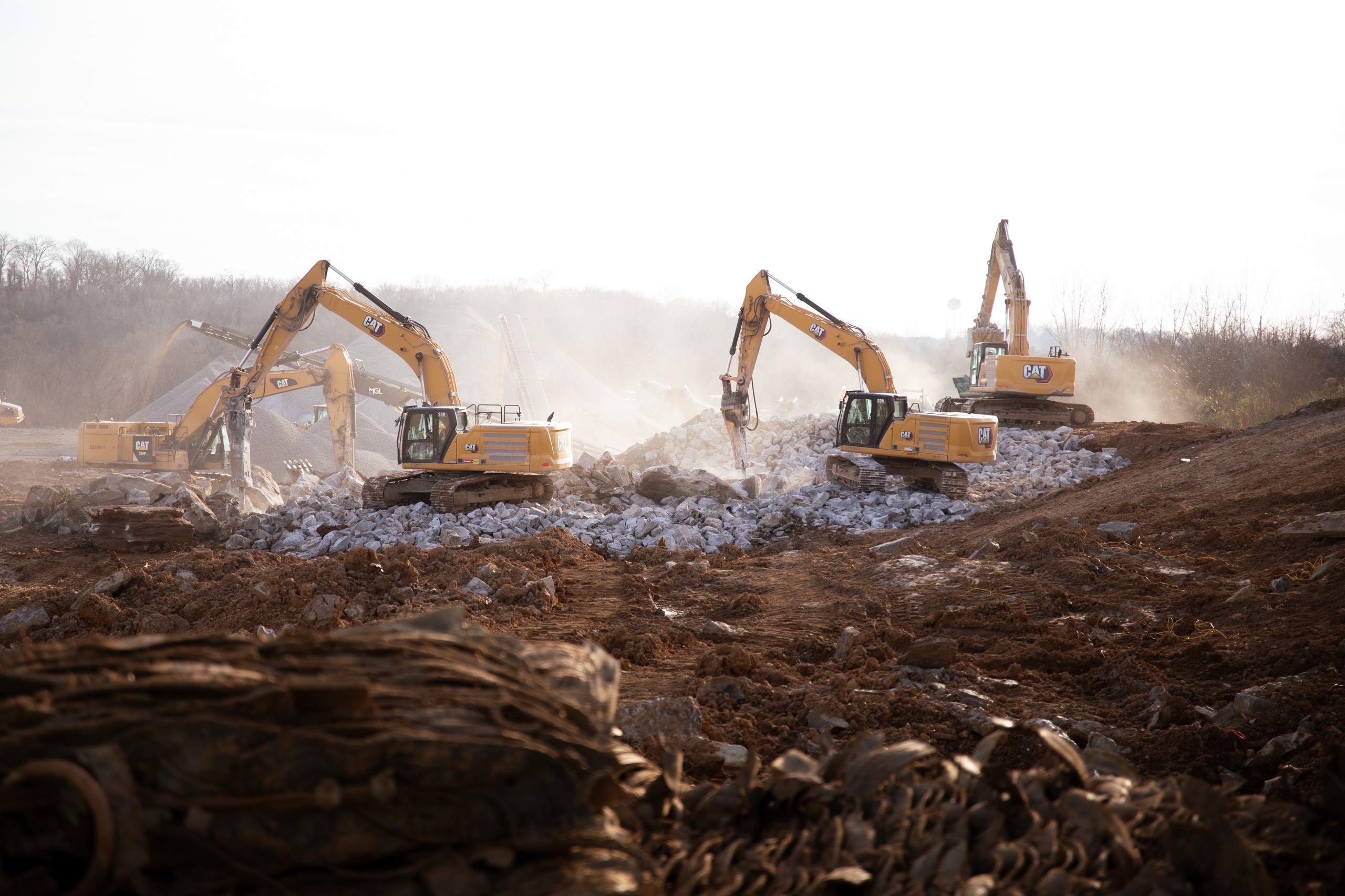Excavators breaking rock during groundwork on Project Hermitage, construction photography by Omar Mohammad Studio