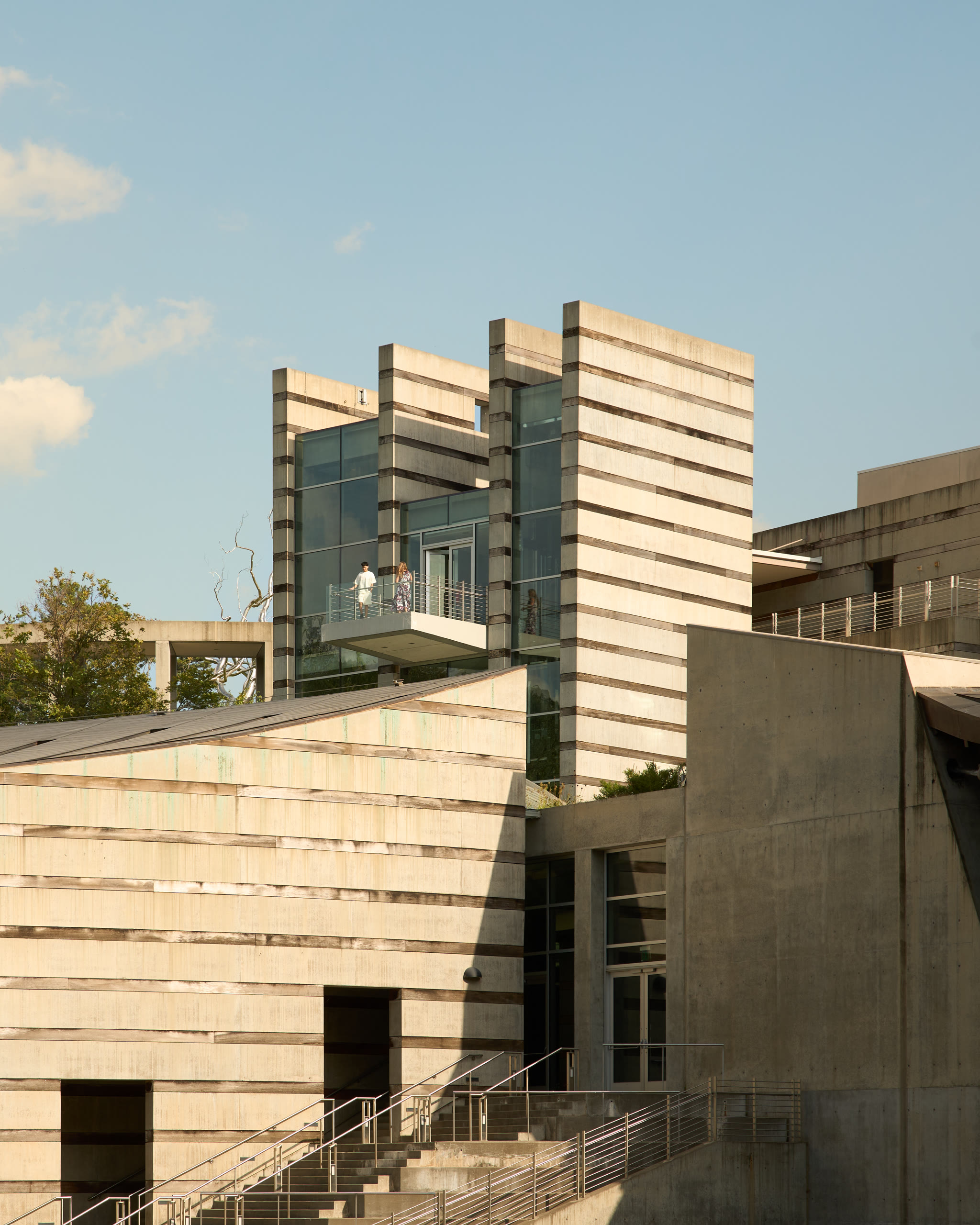 Concrete stair towers and glass at Crystal Bridges Museum of American Art, architectural photography by Omar Mohammad Studio