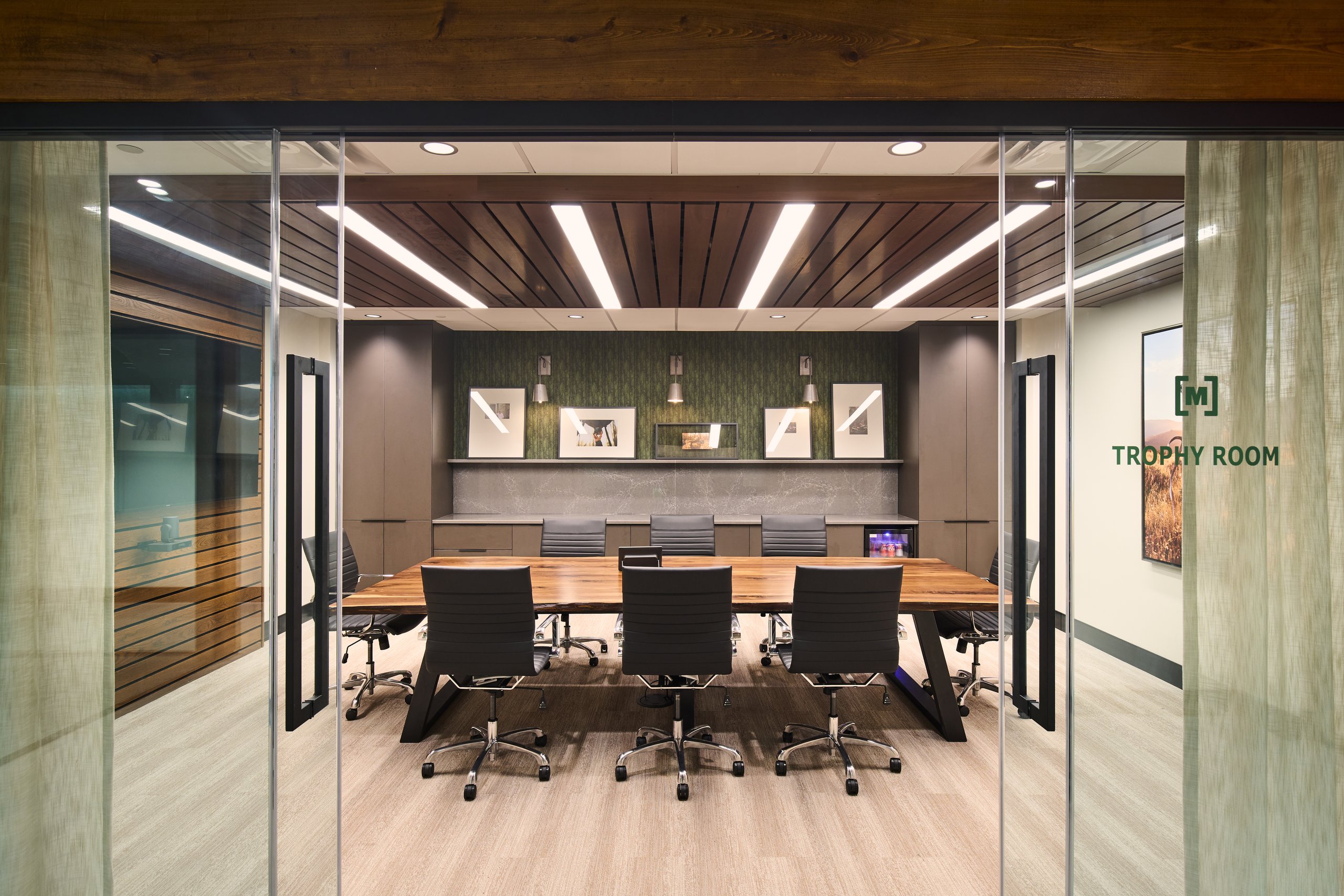 Conference room behind a glass wall at the Moultrie office