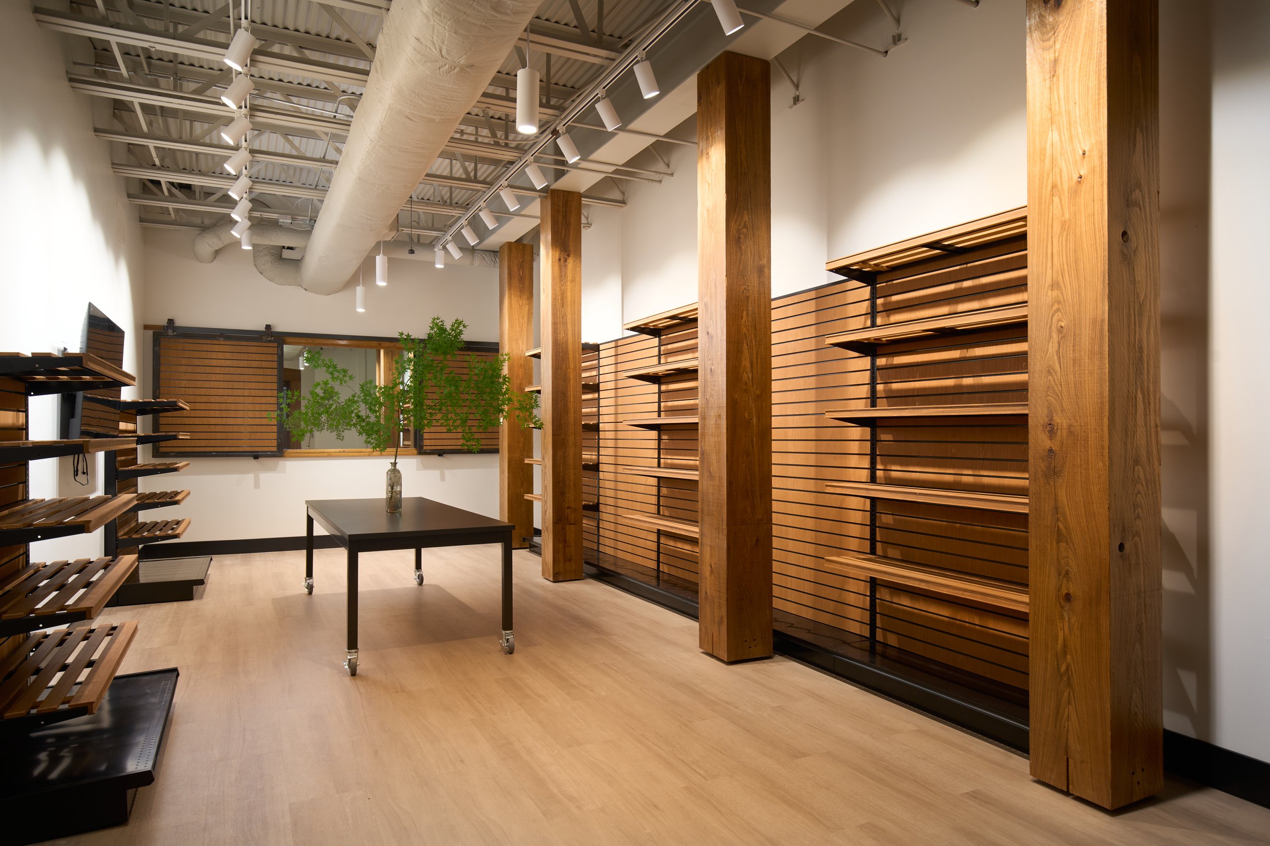 Wood slat wall and timber post in a meeting area at the Moultrie office