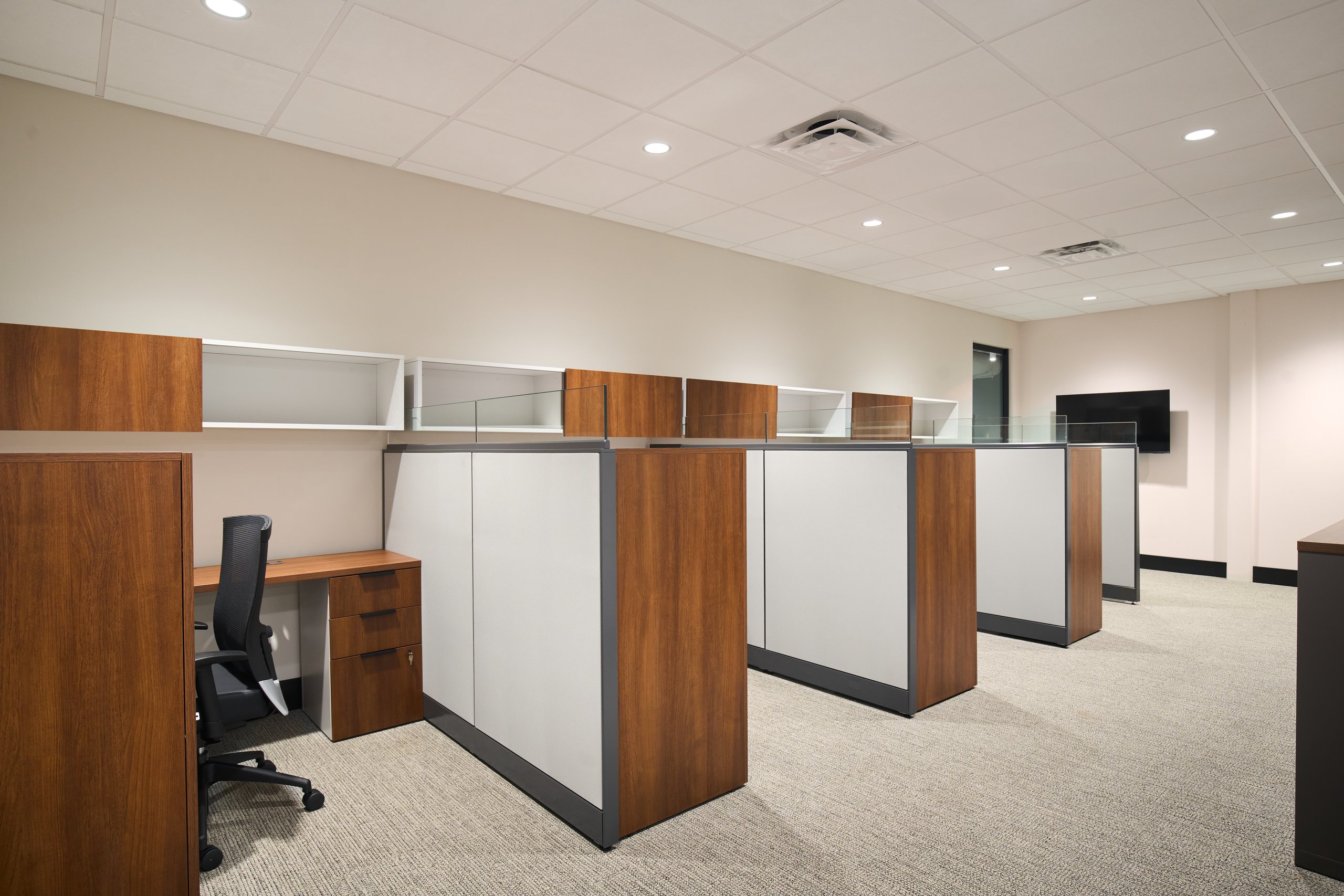 Open workstations with wood partitions at the Moultrie office