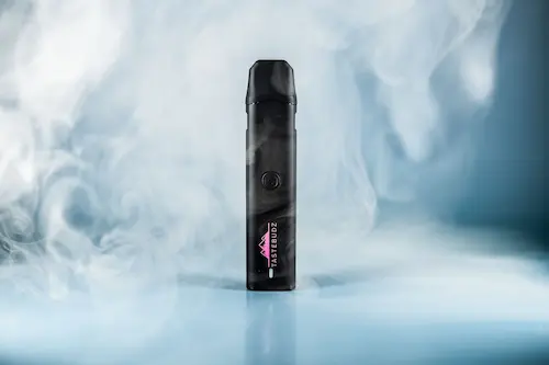 Black vape device labeled Starbuds standing upright surrounded by swirling vapor on a blue surface.