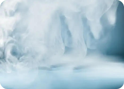 Thick white mist or smoke swirling against a blue background.
