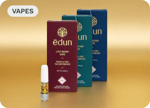 Three boxes of Edun Live Rosin Vape in maroon, green, and blue with a white vape cartridge displayed in front.