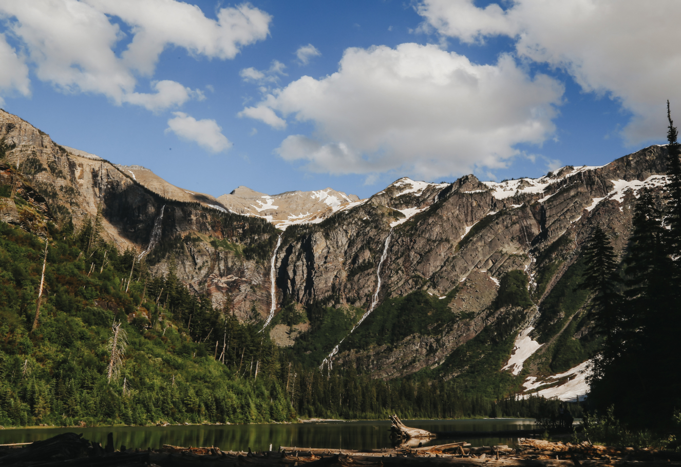 Bride and groom standing in Montana meadow at Highland Ranch
