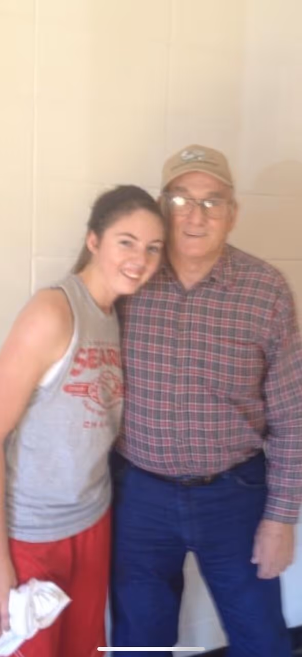 Arielle Butler poses with Kendra Bailey's grandfather an a fundraiser for Kendra's Voice