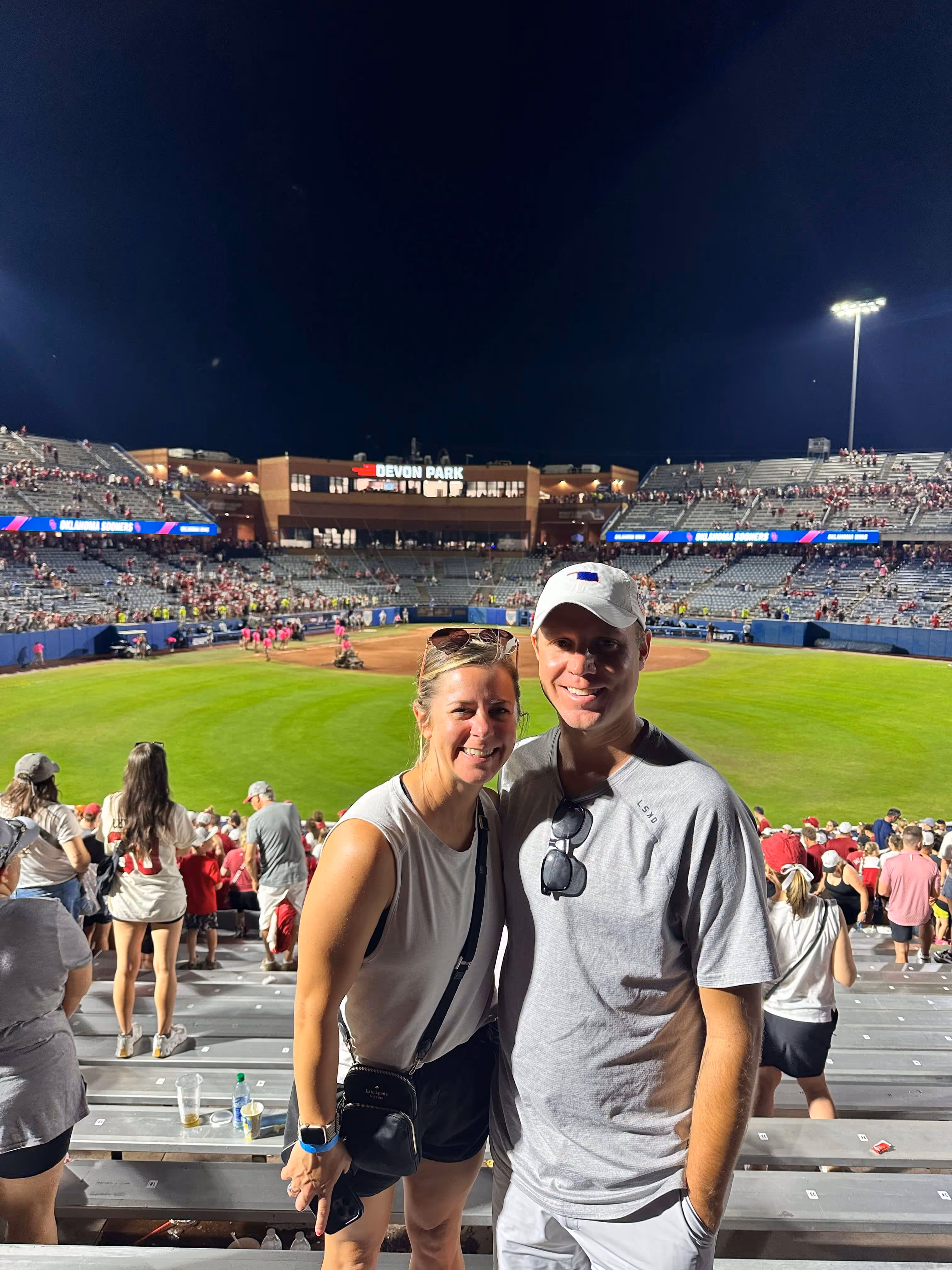 Chris Haworth and his sister at an OU softball game during the World Series