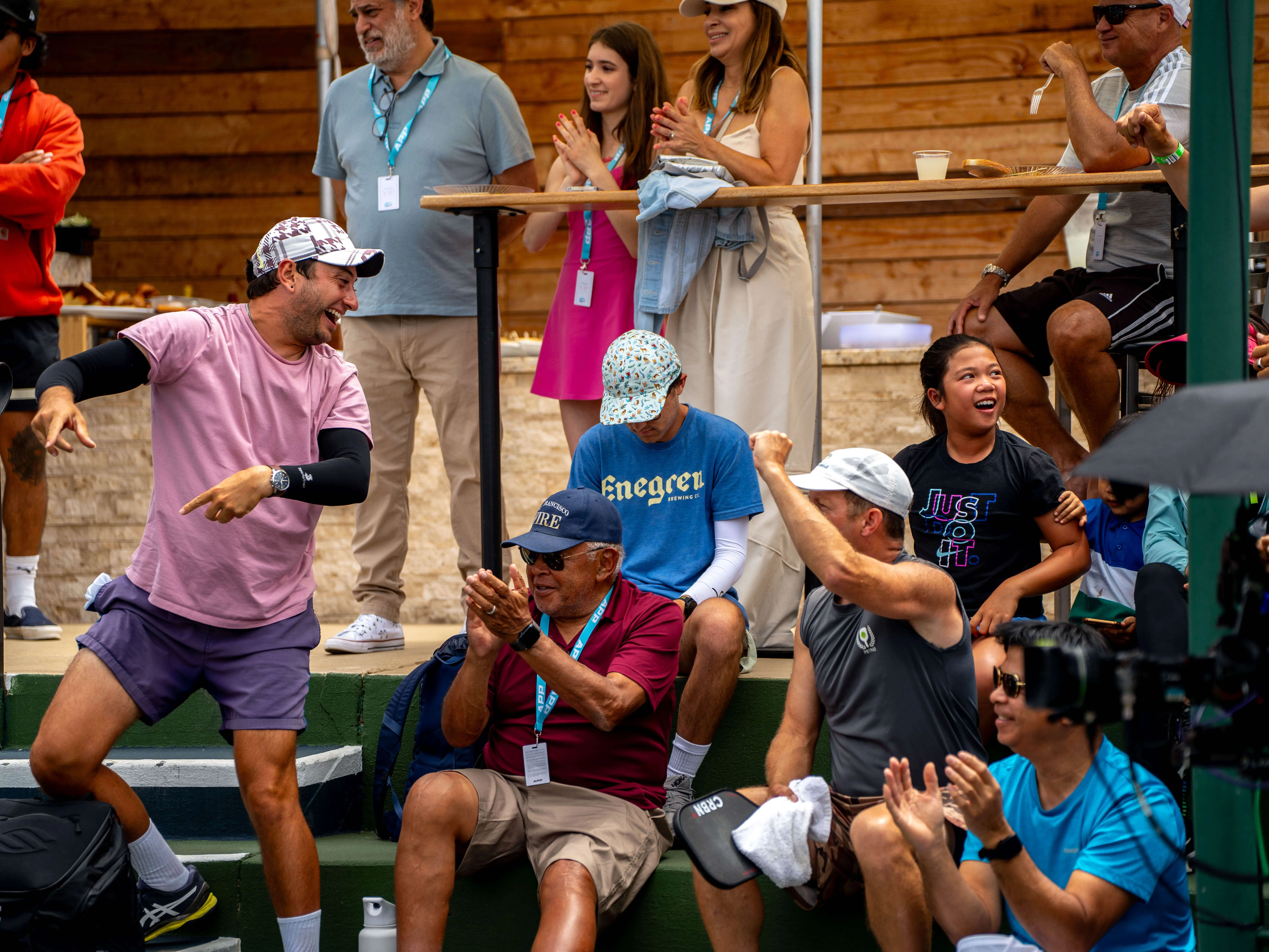 The crowd reacts as pickleballs are thrown into the crowd during Championship Sunday at the 2023 APP Newport Beach Open.