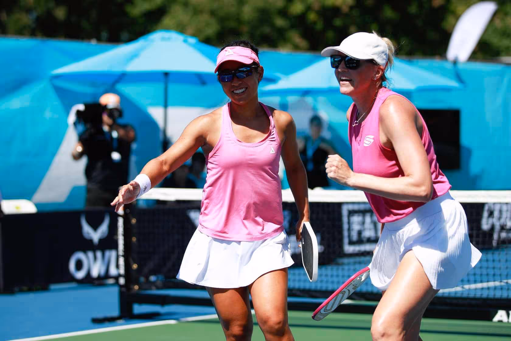 Professional pickleball players Bobbi Oshiro and Susannah Barr celebrate a point at the 2024 APP Chicago Open