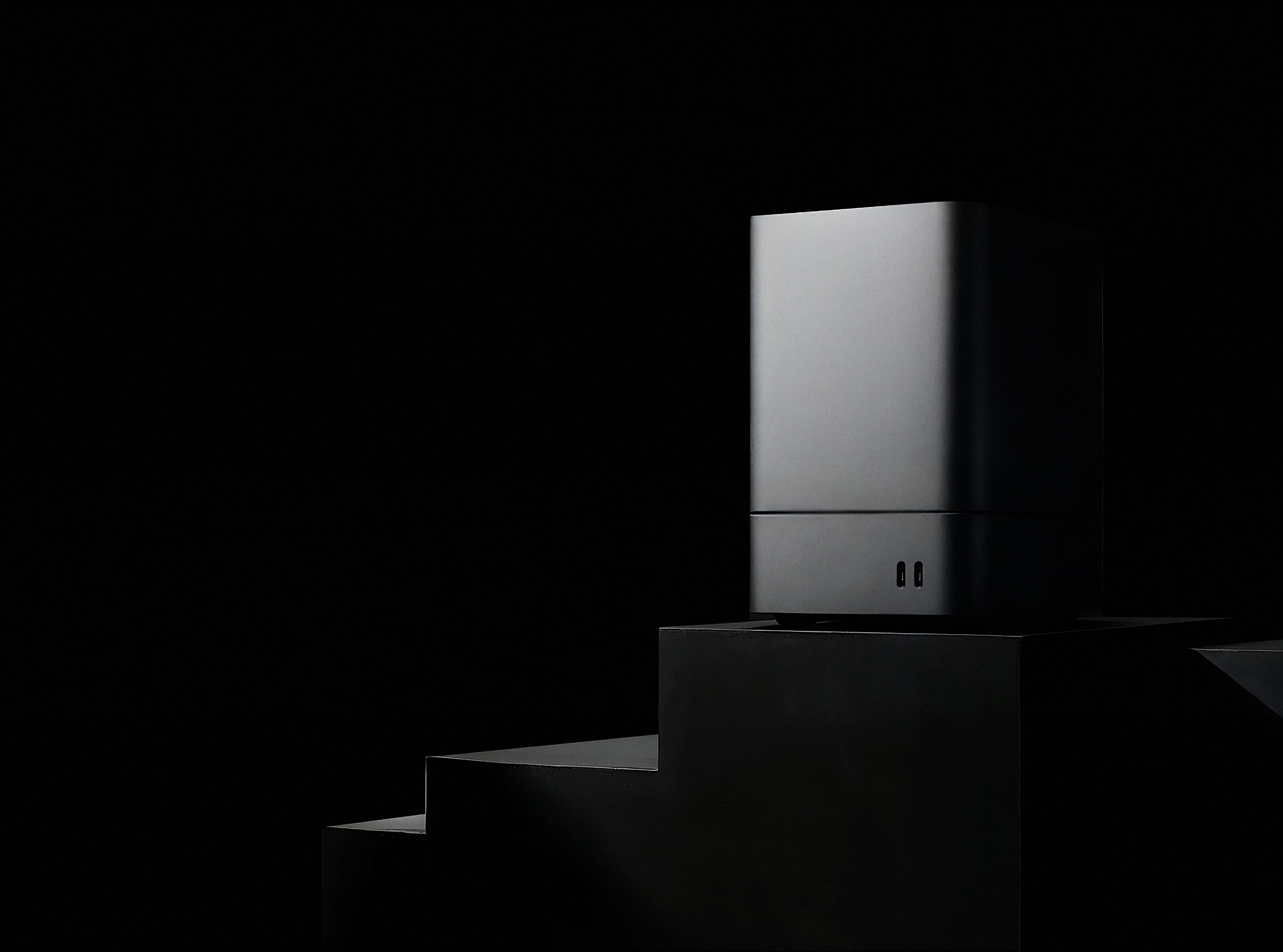 Minimalist Silver Device On Stepped Dark Pedestal PromptEngine Webflow Template | BRIX Template