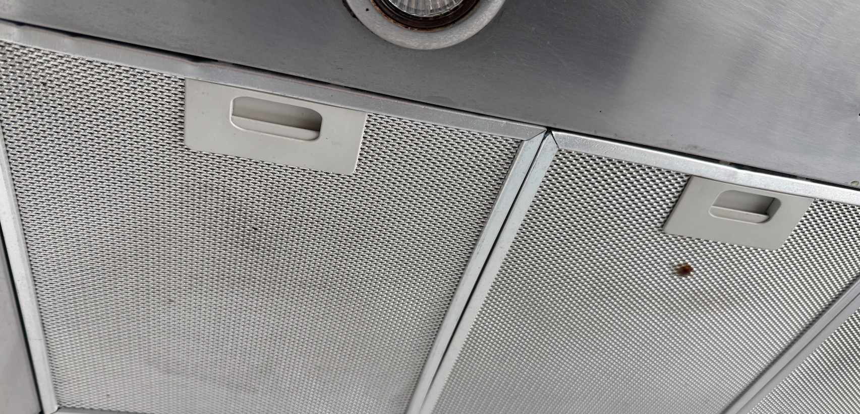 Stainless steel range hood with greasy mesh grease filters