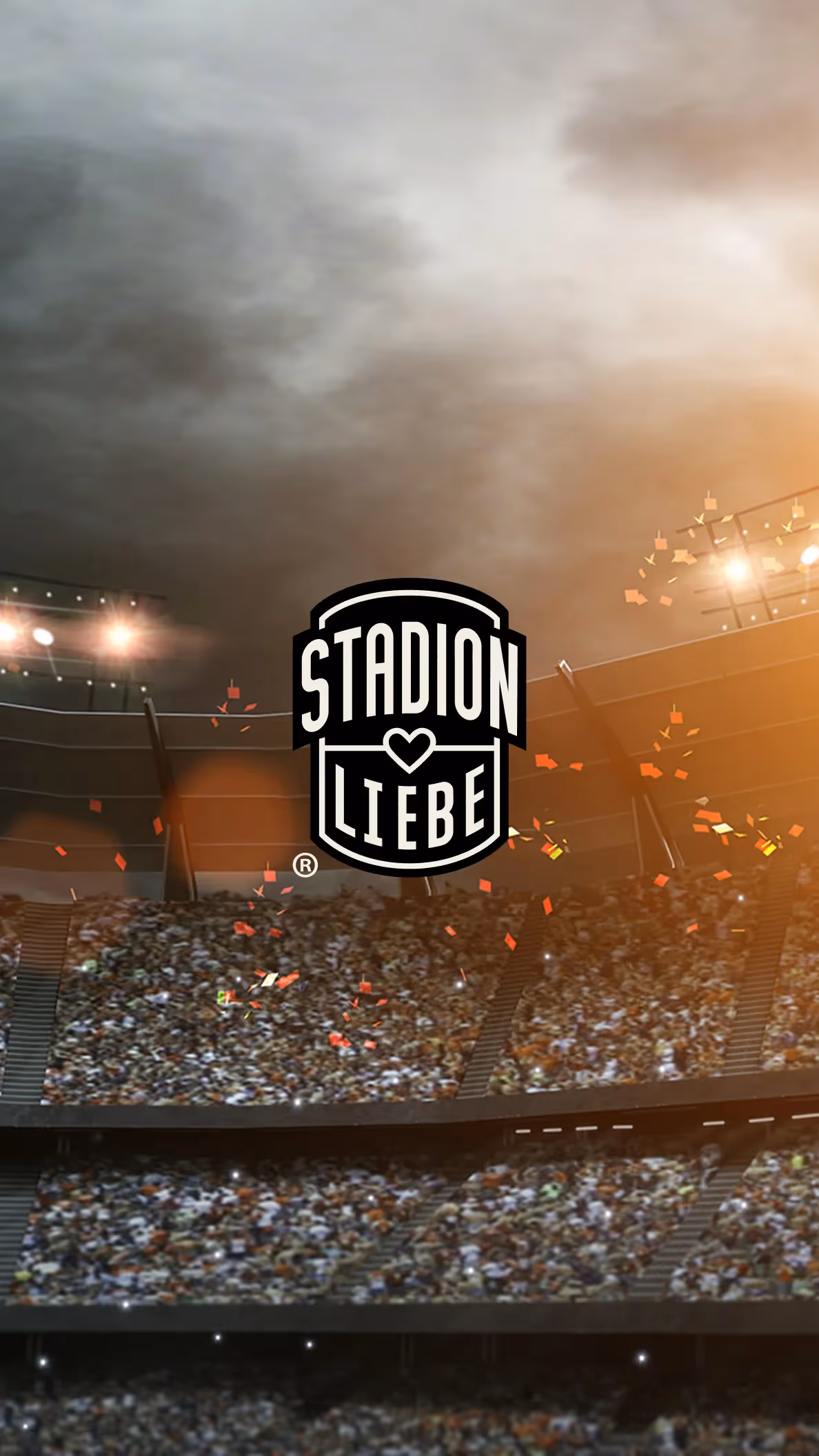 Stadionatmosphäre mit Stadionliebe Logo und leuchtenden Lichtern
