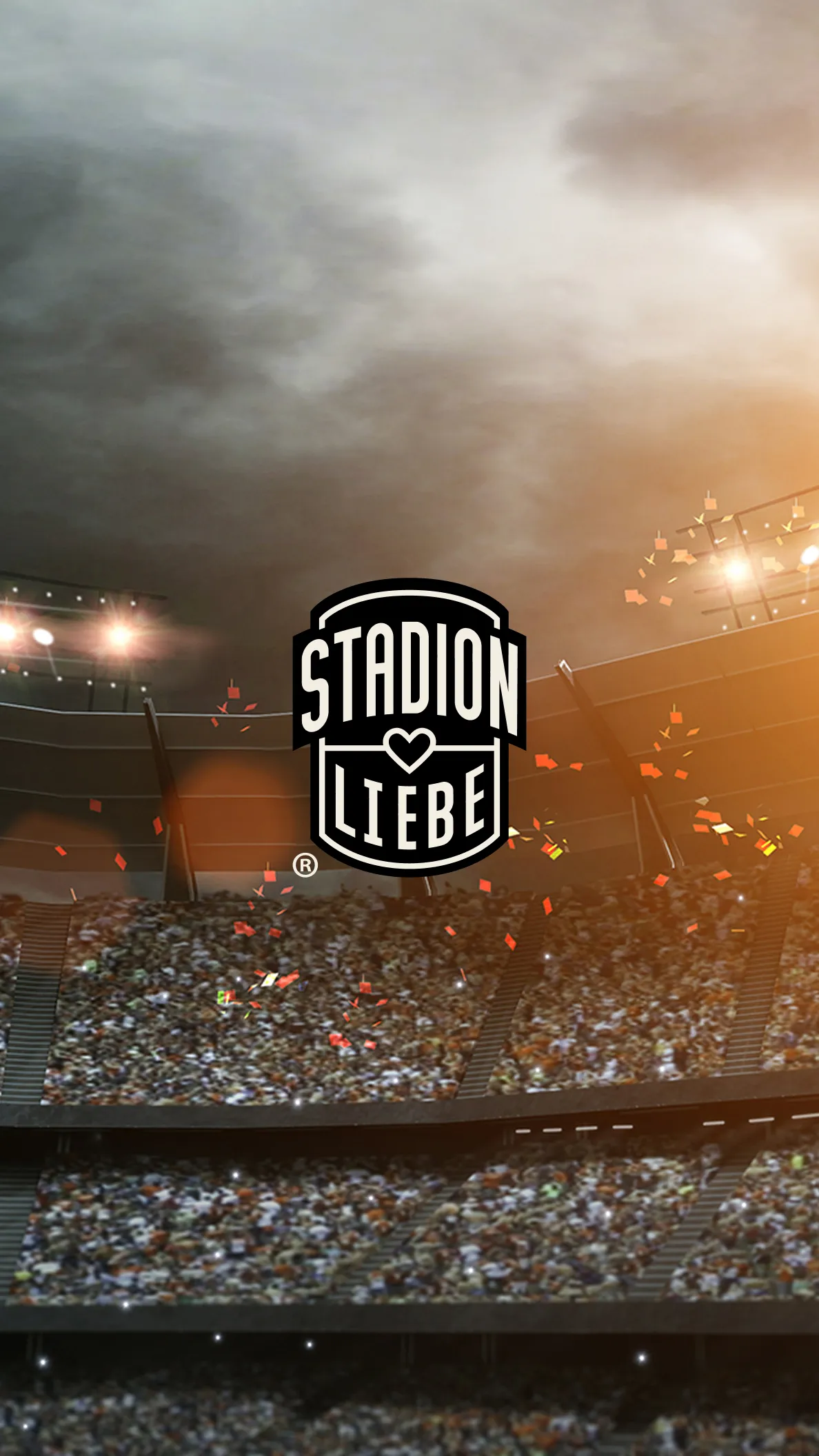 Stadionatmosphäre mit Stadionliebe Logo und leuchtenden Lichtern