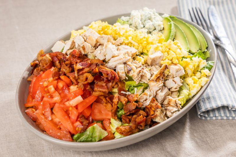 CLASSIC COBB SALAD WITH FRESH INGREDIENTS.