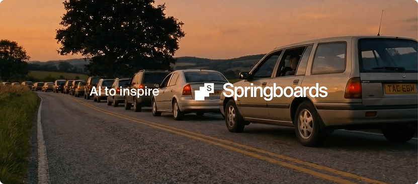 Photograph of a traffic jam with text that reads AI to inspire, Springboards, overlaid 