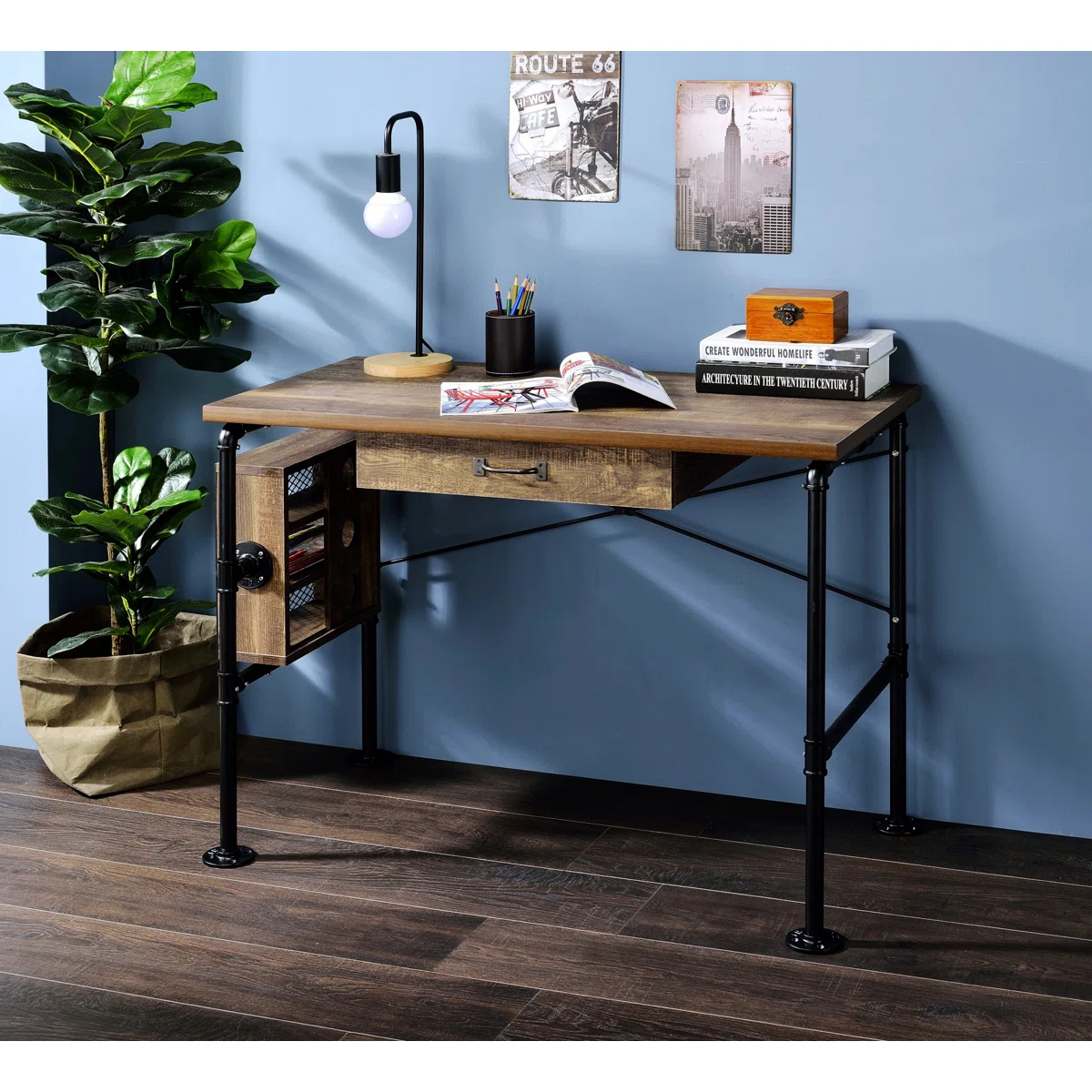 Industrial-style writing desk with wood surface, pipe metal frame, drawer, and side cabinet