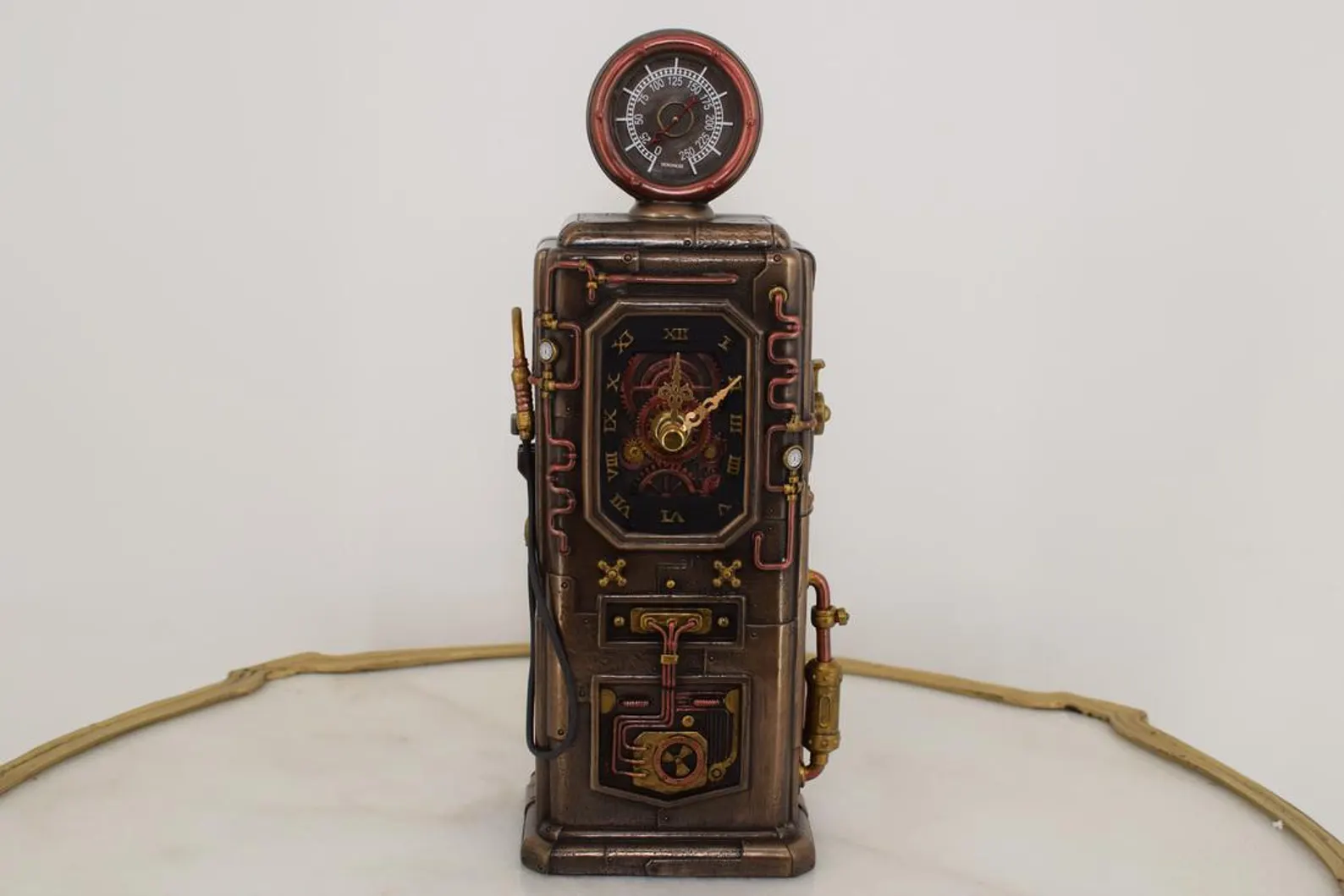 Steampunk clock styled like vintage fuel pump with exposed pipes and brass details