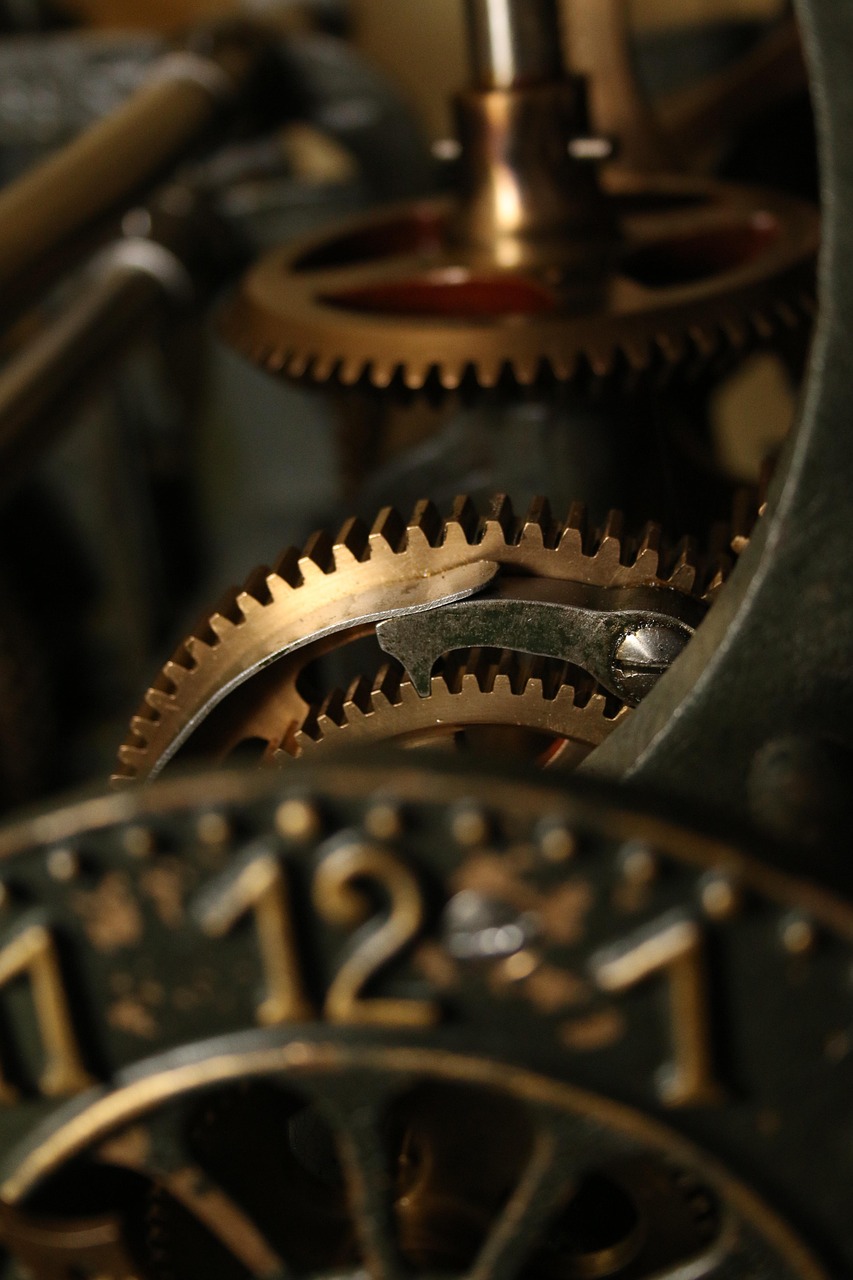 Brass and copper gears in a mechanical device.