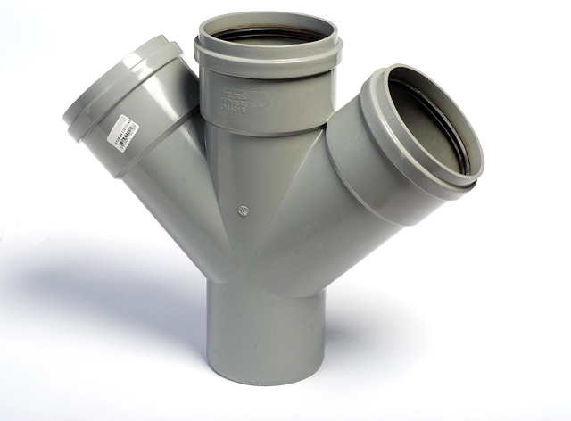A pipe fitting made from durable plastic.