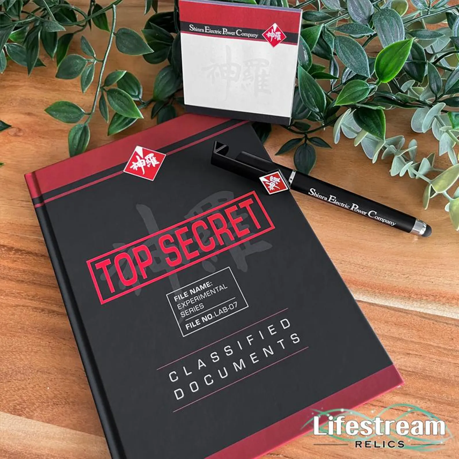 Shinra Electric Power Company “Top Secret” notebook with matching pen and sticky notes on a wood surface