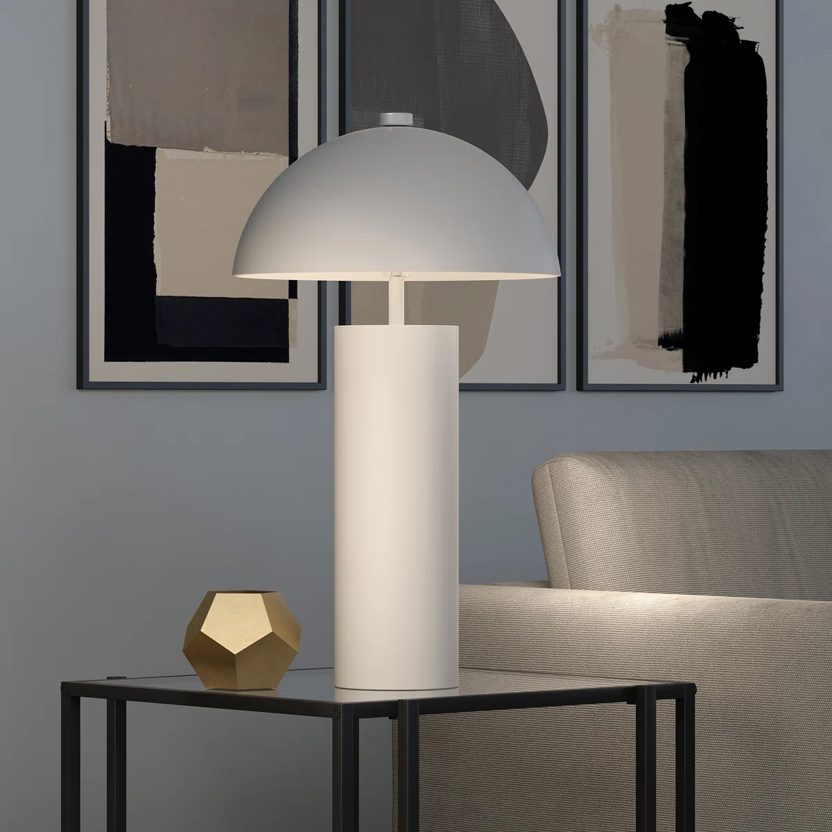 White modern table lamp with dome-shaped shade on a glass side table