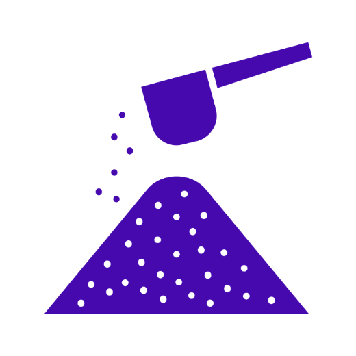 Purple scoop pouring granulated powder onto a pile of powder.