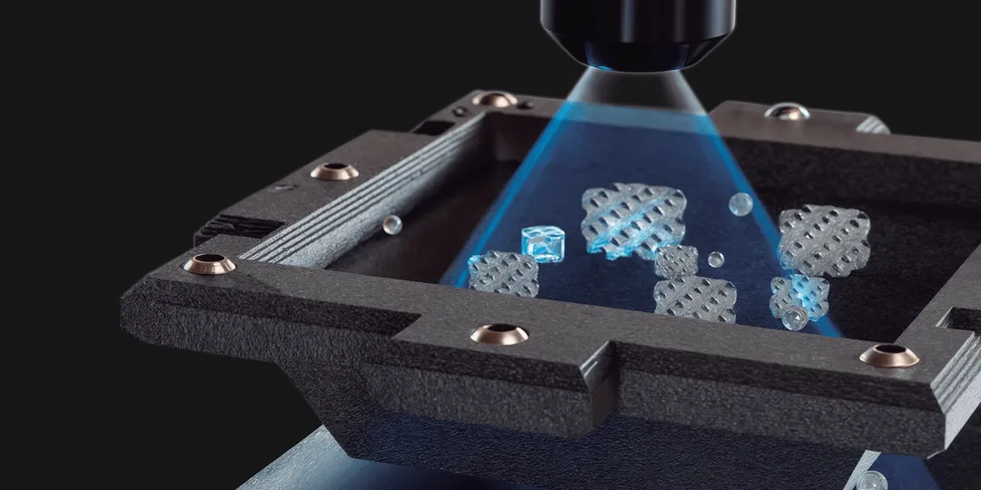 A close up of a metal object with a blue light coming out of it.