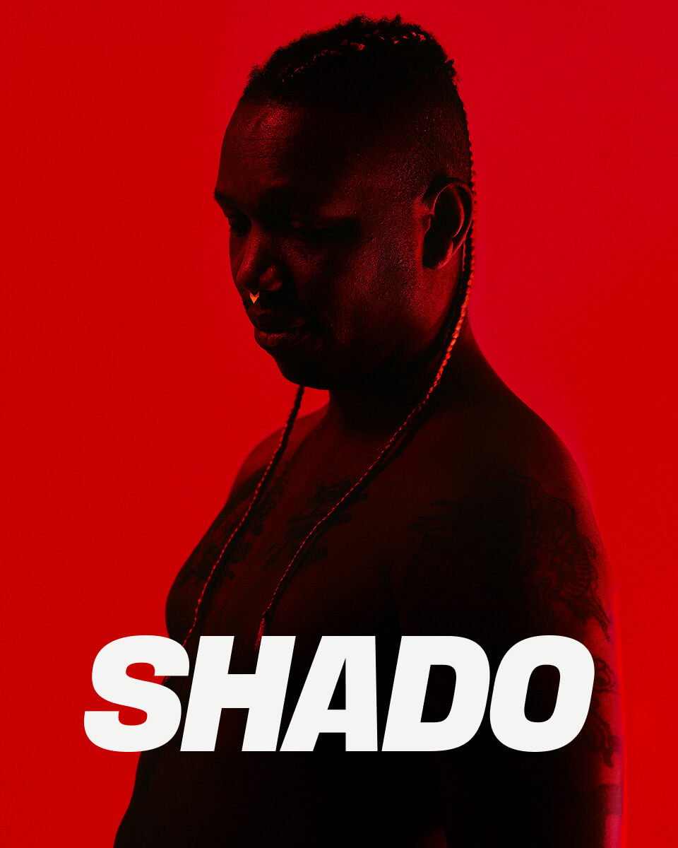 Cover of the Shado project — a dark portrait on a red background.